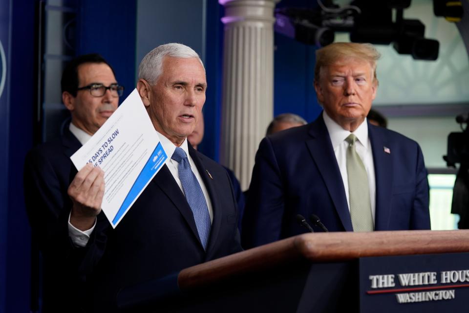 Vice President Mike Pence speaks during a press briefing with the coronavirus task force, at the White House, Tuesday, March 17, 2020, in Washington, as President Donald Trump looks on.