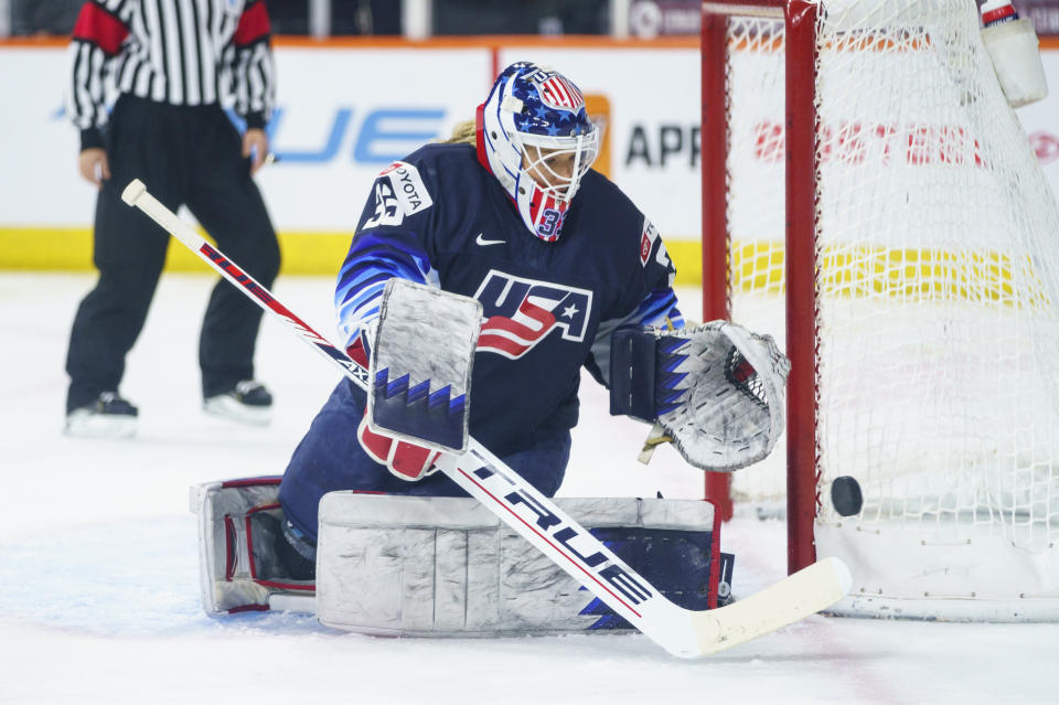 United States' Alex Cavallini knocks away the puck during the first period of the team's hockey game against the Canada, Friday, Oct. 22, 2021, in Allentown, Pa. (AP Photo/Chris Szagola)