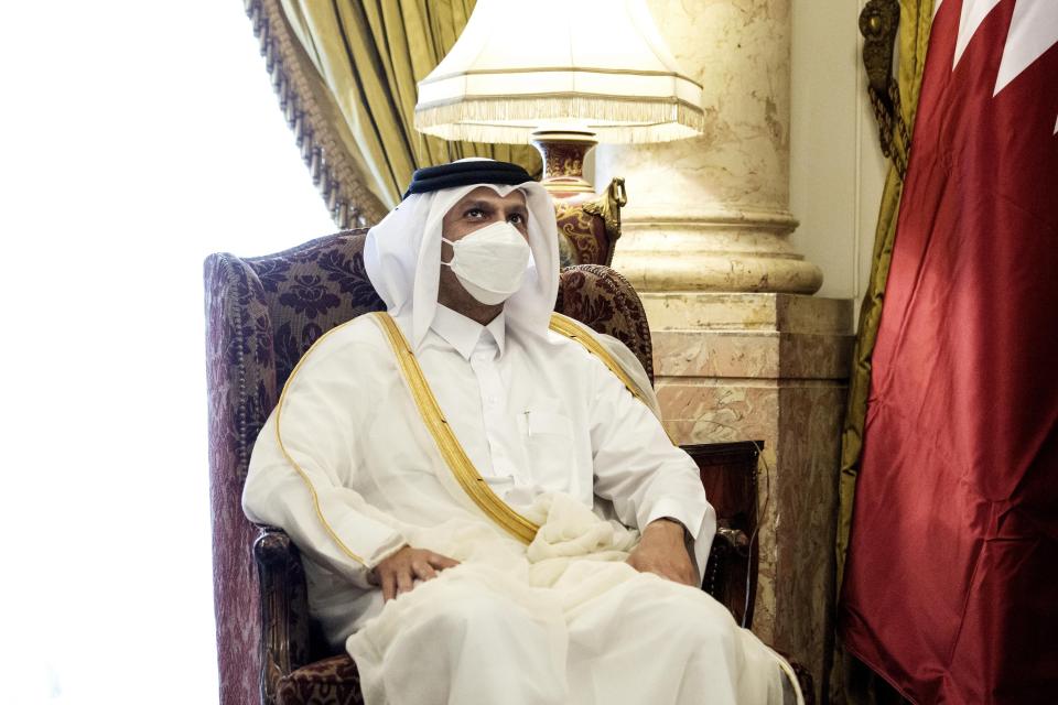 Qatar's Deputy Prime Minister and Foreign Minister Sheikh Mohammed bin Abdulrahman bin Jassim Al-Thani, meets with Egyptian Foreign Minister Sameh Shoukry at the Tahrir Palace in Cairo, Egypt, Tuesday, May 25, 2021. (AP Photo/Nariman El-Mofty)