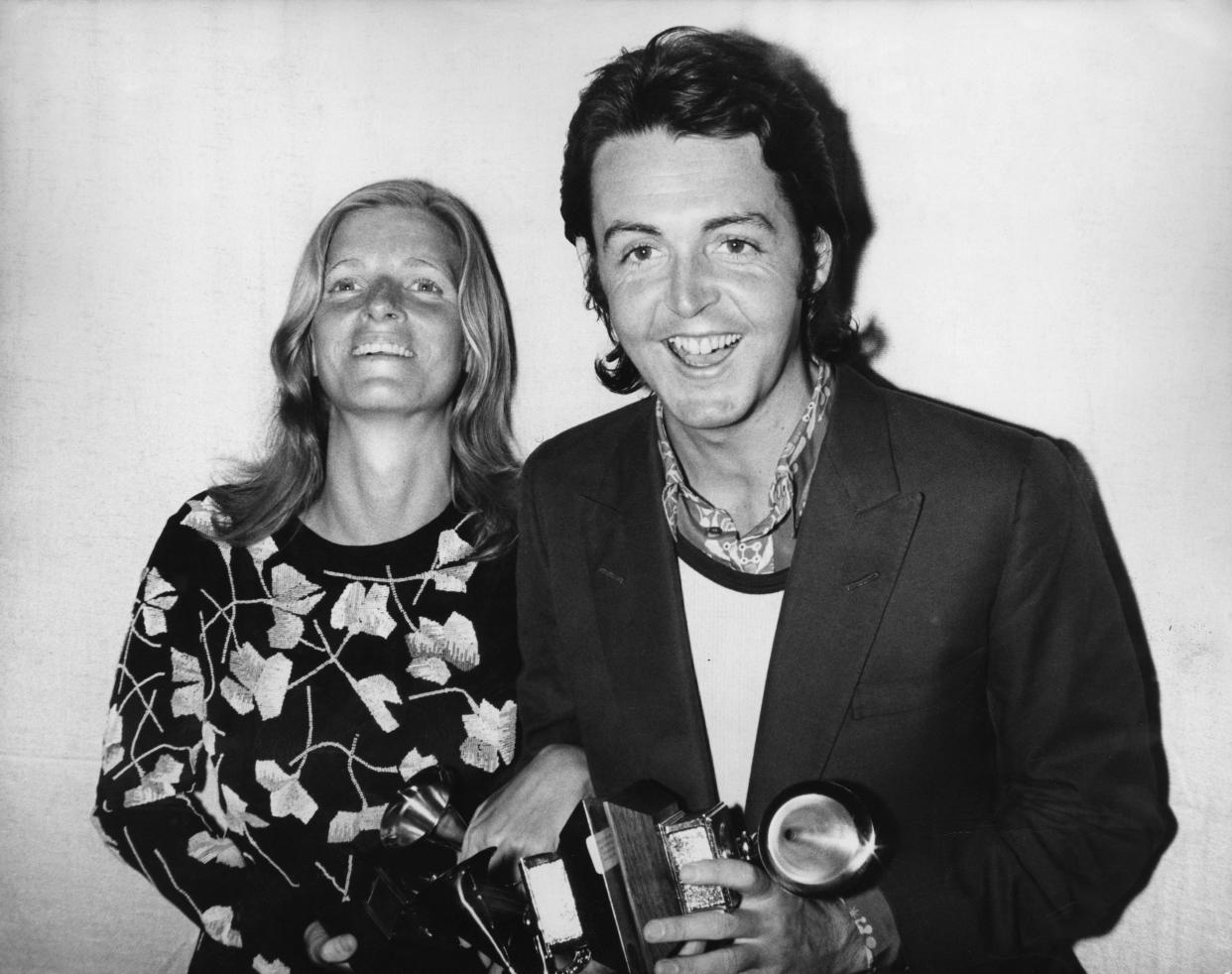 Paul McCartney and his wife Linda attend the 13th Grammy Awards at the Hollywood Palladium, Los Angeles, 16th March 1971. Paul is collecting the award for Best Original Score Written for a Motion Picture or a Television Special on behalf of the Beatles, for the song 'Let It Be'. (Photo by Keystone/Hulton Archive/Getty Images)