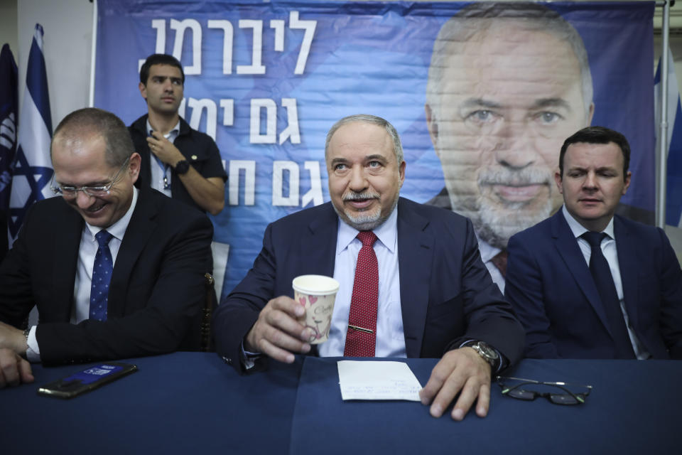 FILE - In this May 30, 2019 file photo, former Israeli Defense Minister and Yisrael Beiteinu party leader Avigdor Lieberman speaks at a press conference in Tel Aviv, Israel. Netanyahu’s nemesis, Lieberman, holds considerable power after his party thwarted the formation of a Likud-led government in April. Once again, he is the kingmaker. (AP Photo/Oded Balilty, File)