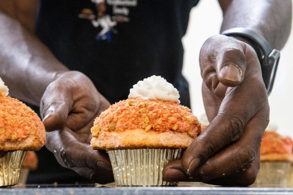 A strawberry cupcake baked by football player-turned-baker Donavon "Monty" Alderman is featured at the Police Athletic League of Wilmington on Wednesday, Dec. 7, 2022. Alderman will be a contestant on the Food Network program "Bake It ‘Til You Make It," premiering Dec. 26.