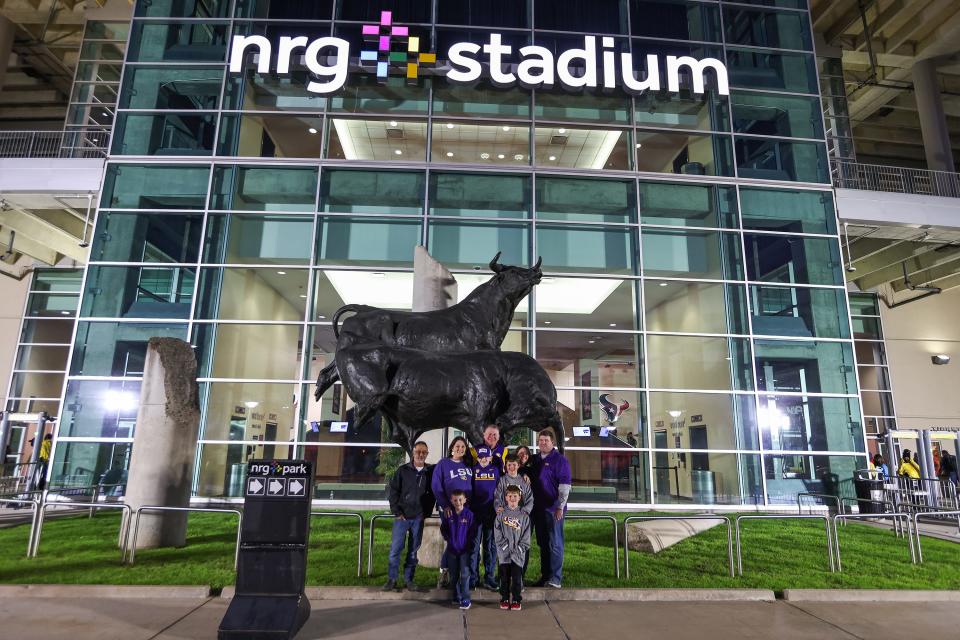 Jan 4, 2022; Houston, TX, USA; The Gates family from Alexander , LA  poses for a photo outside before the LSU Tigers play against the Kansas State Wildcats in the 2022 Texas Bowl at NRG Stadium. Mandatory Credit: Thomas Shea-USA TODAY Sports