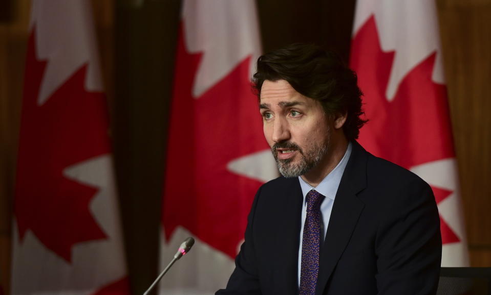 In this April 23, 2021 photo, Canada Prime Minister Justin Trudeau speaks during a news conference in Ottawa. Drug maker Pfizer says, Friday, April 30, it will start sending U.S.-produced COVID-19 vaccines to Canada next week. It's the first time the U.S. has allowed that company’s vaccine exported north. (Sean Kilpatrick/The Canadian Press via AP, File)