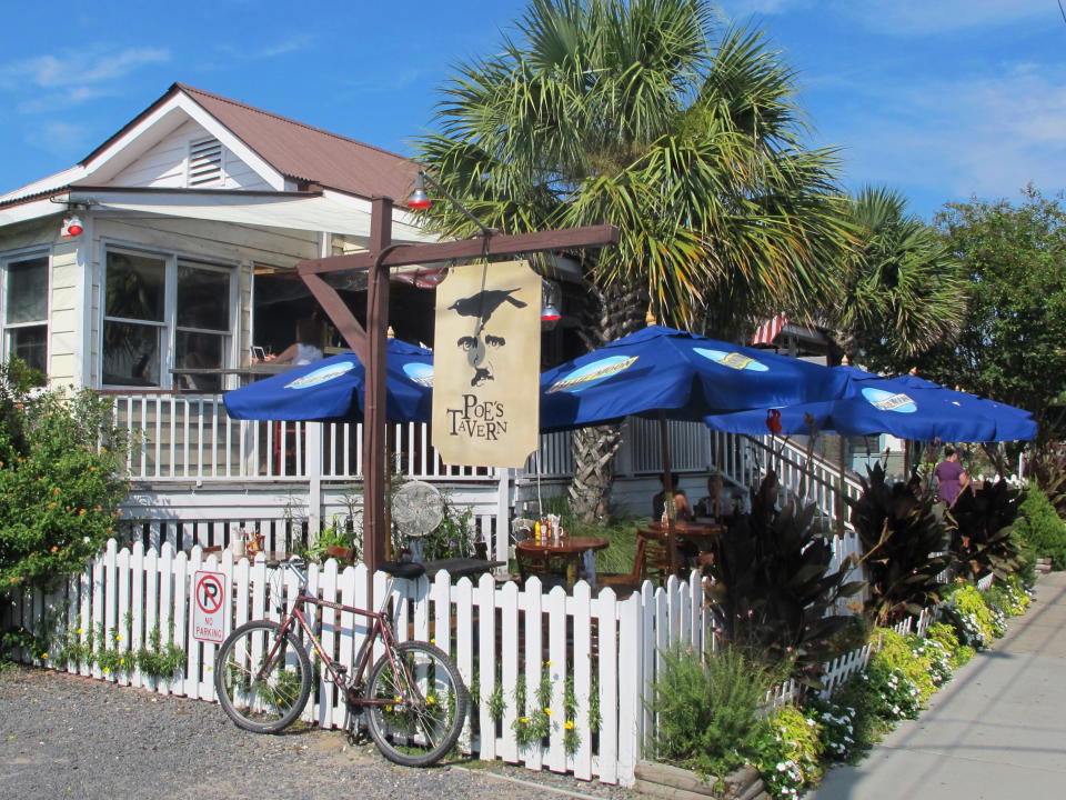 Poe's Tavern, a restaurant on Sullivans Island, S.C., is seen in this Sept. 12, 2013 photo. The restaurant is one of about a dozen on Sullivans Island just outside Charleston, S.C. (AP Photo/Bruce Smith)