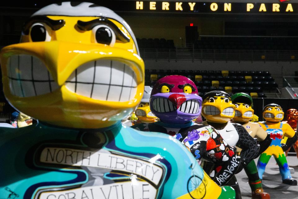 Completed versions of the third iteration of the Herky on Parade statudes stand Monday, April 29, 2024 at Xtream Arena in Coralville, Iowa.