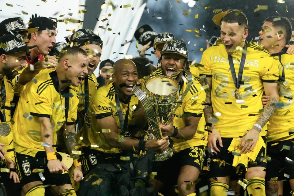 Crew players celebrate with the Philip F.. Anschutz Trophy after defeating the Los Angeles FC in the 2023 MLS Cup.