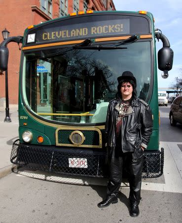 Michael Yelko II, a Cleveland regional Transit Authority Trolley driver poses as Alice Cooper as part of the Rock and Roll Hall of Fame Induction week in Cleveland, Ohio April 15, 2015. REUTERS/Aaron Josefczyk