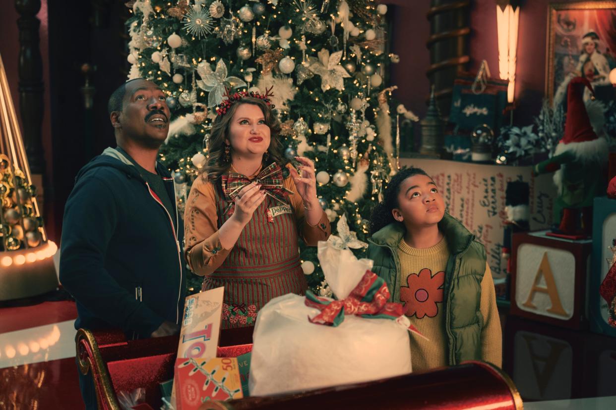 From left, Eddie Murphy as Chris Carver, Jillian Bell as Pepper, and Madison Thomas as Holly Carver in "Candy Cane Lane."