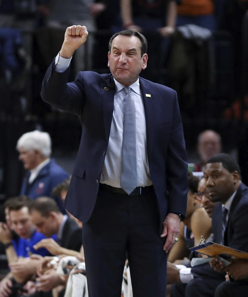 Duke head coach Mike Krzyzewski calls a play during an NCAA college basketball game against Virginia Saturday, Feb. 29, 2020, in Charlottesville, Va. (AP Photo/Andrew Shurtleff)