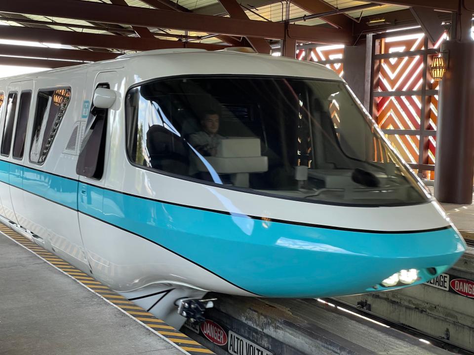 The monorail pulls up to the station.