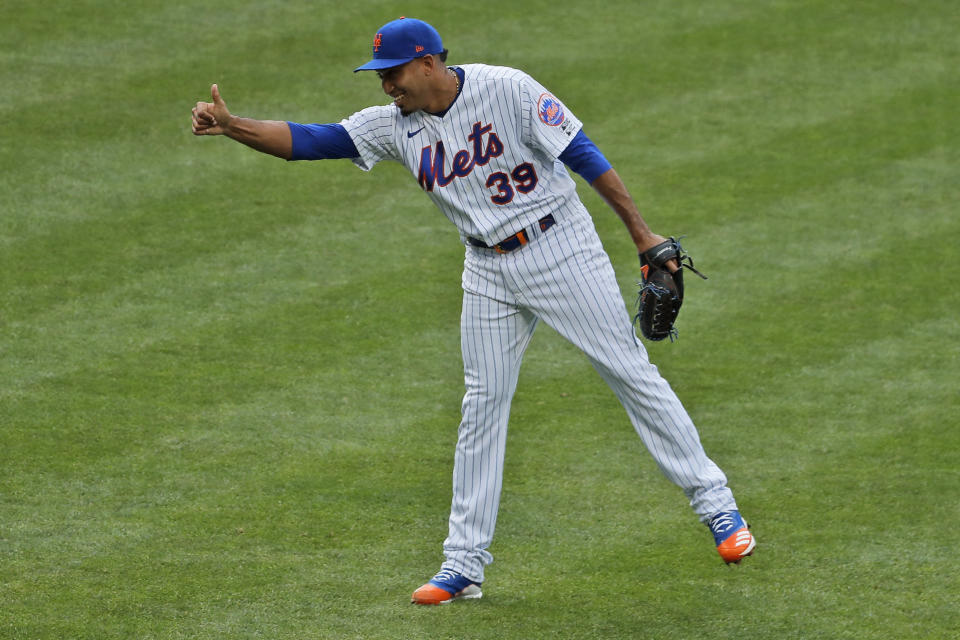 New York Mets relief pitcher Edwin Diaz reacts after the last out of a baseball game against the Atlanta Braves at Citi Field, Friday, July 24, 2020, in New York. (AP Photo/Seth Wenig)