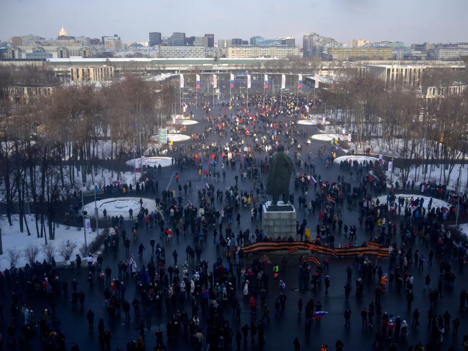 People gather for a rally dedicated to the upcoming Defender of the Fatherland Day at the Luzhniki stadium in Moscow on February 22.