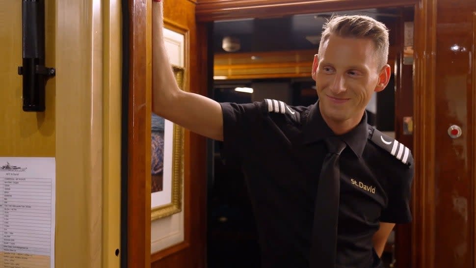 Fraser Olender offers Captain Kerry Titheradge a cheeky smile on 'Below Deck.'
