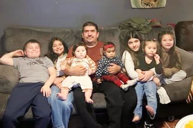 <p>Courtesy of the Parra Family</p> Hugo Parra with his grandchildren