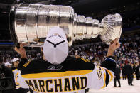 VANCOUVER, BC - JUNE 15: Brad Marchand #63 of the Boston Bruins kisses the Stanley Cup after defeating the Vancouver Canucks in Game Seven of the 2011 NHL Stanley Cup Final at Rogers Arena on June 15, 2011 in Vancouver, British Columbia, Canada. The Boston Bruins defeated the Vancouver Canucks 4 to 0. (Photo by Bruce Bennett/Getty Images)