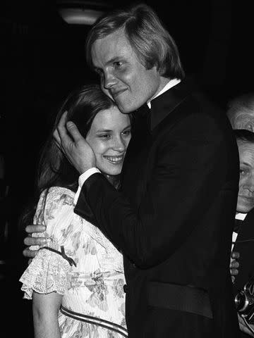 <p>Tom Wargacki/WireImage</p> Marcheline Bertrand and Jon Voight share an embrace in New York City in March 1971.