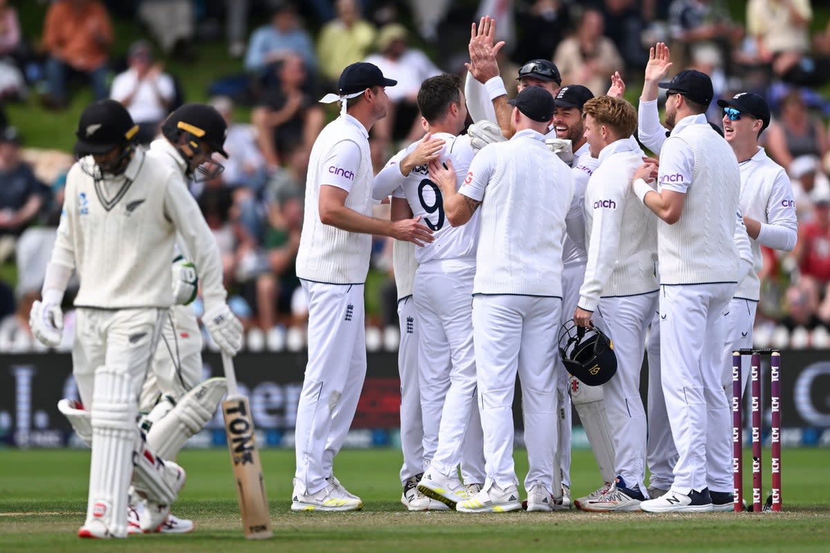 England players celebrate the wicket of Devon Conway (Andrew Cornaga/AP) (AP)