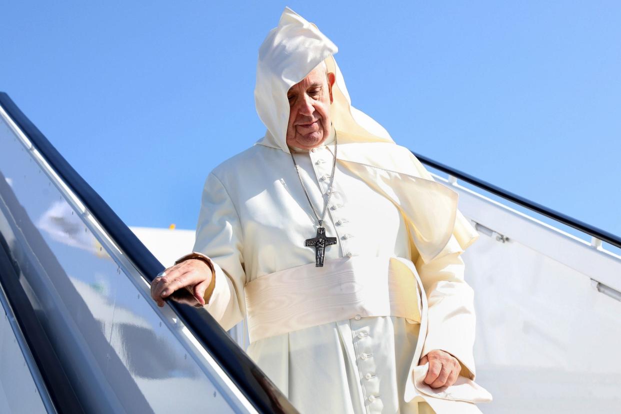 Pope Francis disembarks from the aircraft as he arrives at Dublin International - Getty Images Europe