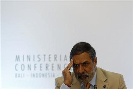 India's trade minister Anand Sharma listens during a news conference at the ninth World Trade Organization (WTO) Ministerial Conference in Nusa Dua, on the Indonesian resort island of Bali December 5, 2013. REUTERS/Edgar Su