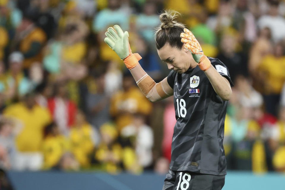 Australia's goalkeeper Mackenzie Arnold reacts after missing a scoring chance during a penalty shootout during the Women's World Cup quarterfinal soccer match between Australia and France in Brisbane, Australia, Saturday, Aug. 12, 2023. (AP Photo/Tertius Pickard)