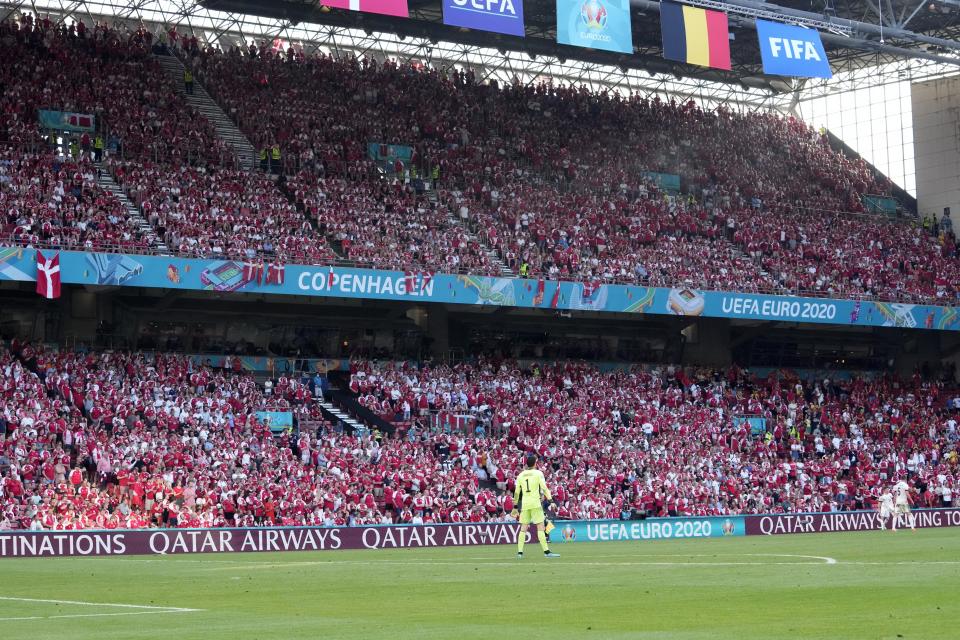 Belgium's goalkeeper Thibaut Courtois stands far from his goalpost during the Euro 2020 soccer championship group B match between Denmark and Belgium at Parken stadium in Copenhagen, Denmark, Thursday, June 17, 2021. (AP Photo/Martin Meissner, Pool)