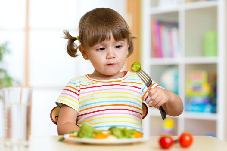 <span class="caption">Picky eaters might just have a different gene variation.</span> <span class="attribution"><a class="link " href="https://www.shutterstock.com/image-photo/little-girl-examines-brussels-sprouts-child-391890634" rel="nofollow noopener" target="_blank" data-ylk="slk:Oksana Kuzmina/ Shutterstock;elm:context_link;itc:0;sec:content-canvas">Oksana Kuzmina/ Shutterstock</a></span>