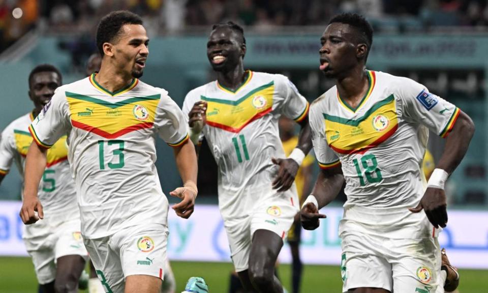 Senegal’s forward Ismaïla Sarr (right) celebrates scoring in the victory over Ecuador in Doha.