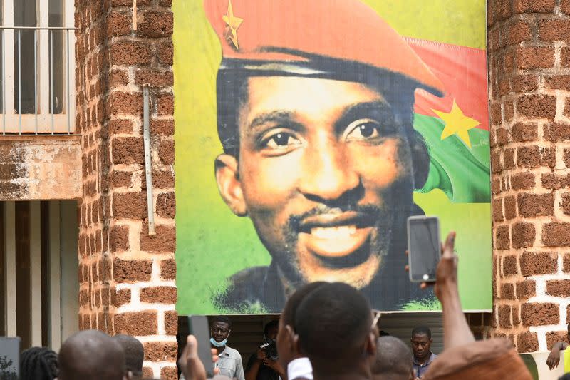 FILE PHOTO: Supporters of the late president Thomas Sankara gather at the his memorial site in Ouagadougou