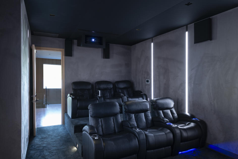 The $5.9 million estate includes a home theater. (Photo: The Agency)