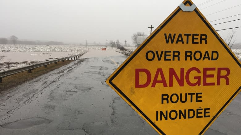 Rising flood waters close roads in several New Brunswick communities