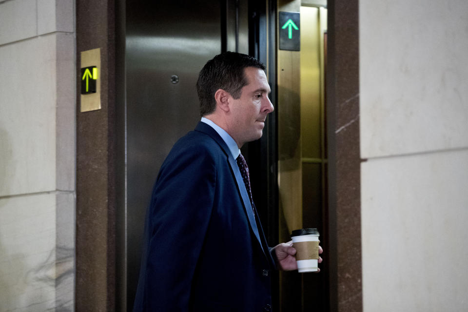 House Intelligence Committee Ranking Member Rep. Devin Nunes, R-Calif., is seen before former U.S. Ambassador William Taylor arrives for a closed door meeting to testify as part of the House impeachment inquiry into President Donald Trump, on Capitol Hill in Washington, Tuesday, Oct. 22, 2019. (AP Photo/Andrew Harnik)