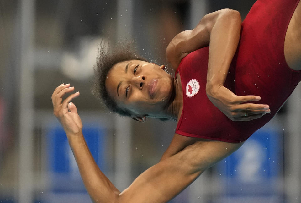 Jennifer Abel of Canada competes in women's diving 3m springboard semifinal at the Tokyo Aquatics Centre at the 2020 Summer Olympics, Saturday, July 31, 2021, in Tokyo, Japan. (AP Photo/Dmitri Lovetsky)