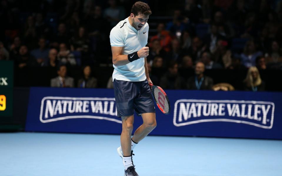 Grigor Dimitrov celebrates against David Goffin on Sunday - Action Plus