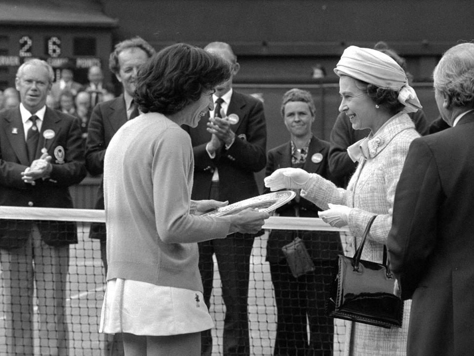 The Queen presents Virginia Wade with the trophy (PA) (PA Archive)