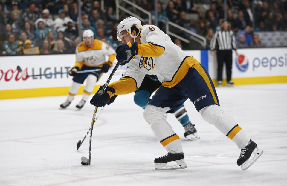 Nashville Predators' Filip Forsberg (9) fires the puck to score against the San Jose Sharks' Marc-Edouard Vlasic (44) in the second period of an NHL hockey game in San Jose, Calif., Tuesday, Nov. 13, 2018. (AP Photo/Josie Lepe)