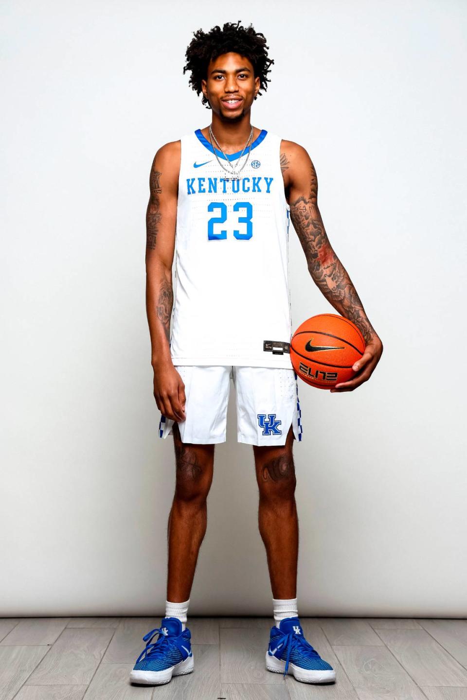 Class of 2023 small forward Jordan Burks poses in a Kentucky men’s basketball uniform during a recruiting visit. Burks committed to Kentucky on Monday morning.