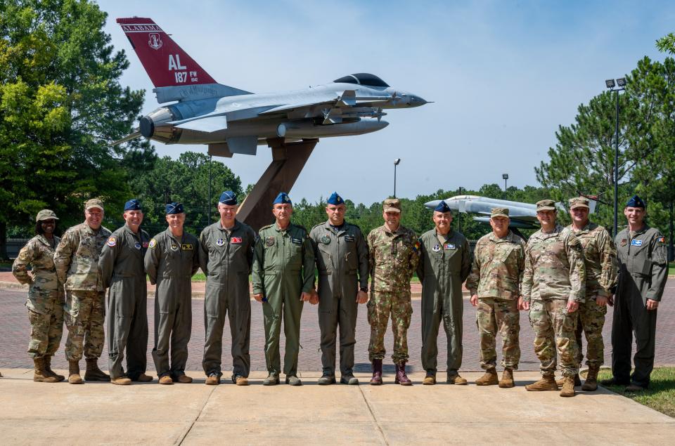 187th Fighter Wing,117th Air Refueling Wing, and Alabama National Guard leadership pose with the Chief of the Romanian Air Force Staff and delegation in front of a Red Tail F-16 Fighting Falcon static display, Dannelly Field, Alabama, June 29, 2023. This year marks the 30th anniversary of the State Partnership Program between Alabama’s 187th Fighter Wing and the Romanian Air Force.