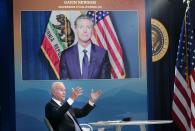 US President Joe Biden speaks as California Governor Gavin Newsom. on a screen, looks on during a meeting with state governors on wildfire prevention and preparedness in the South Court Auditorium of the Eisenhower Executive Office Building, next to the White House, in Washington, DC on July 30, 2021. (Photo by MANDEL NGAN / AFP) (Photo by MANDEL NGAN/AFP via Getty Images)