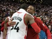 May 15, 2016; Toronto, Ontario, CAN; Toronto Raptors forward Patrick Patterson (left) hugs Miami Heat guard Dwyane Wade (right) at the end of game seven of the second round of the NBA Playoffs at Air Canada Centre. The Toronto Raptors won 116-89. Mandatory Credit: Nick Turchiaro-USA TODAY Sports