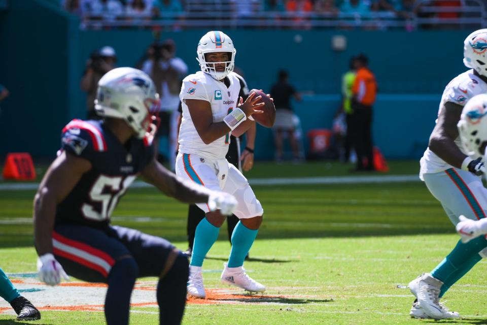 Miami Dolphins quarterback Tua Tagovailoa (1) looks to throw the ball down the field in the second half during the game between the New England Patriots and host Miami Dolphins at Hard Rock Stadium in Miami Gardens, FL, on Sunday, September 11, 2022. Final score, Dolphins, 20, Patriots, 7.