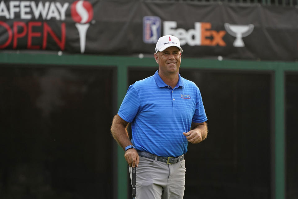 Stewart Cink reacts after making a birdie putt on the 18th green of the Silverado Resort North Course during the final round of the Safeway Open PGA golf tournament Sunday, Sept. 13, 2020, in Napa, Calif. Cink won the tournament after shooting a 7-under-par 65 to finish at total 21-under-par. (AP Photo/Eric Risberg)