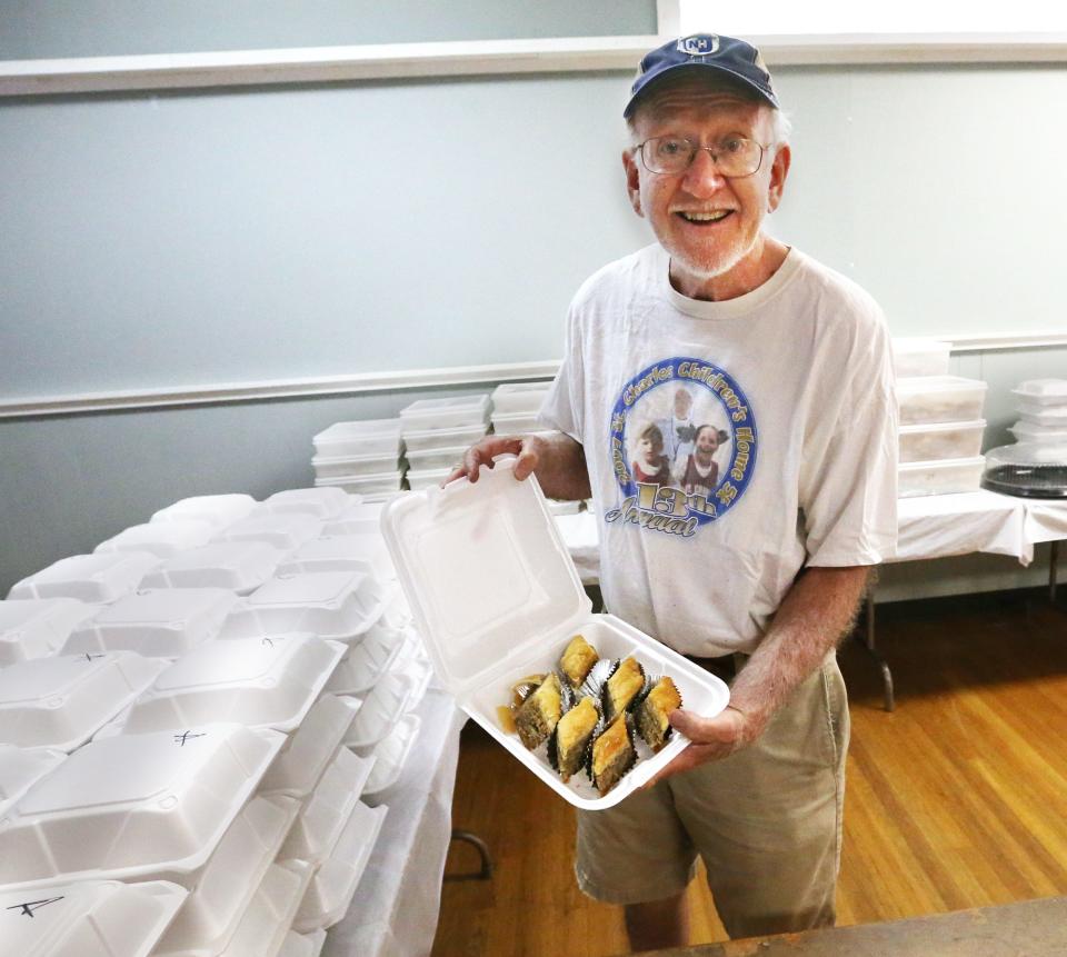 Paul Maskwa displays baklava while preparting Thursday, Sept. 1, 2022 for the Dover Greek Festival. The event will be held Friday and Saturday, Sept. 2-3 at the Hellenic Center.