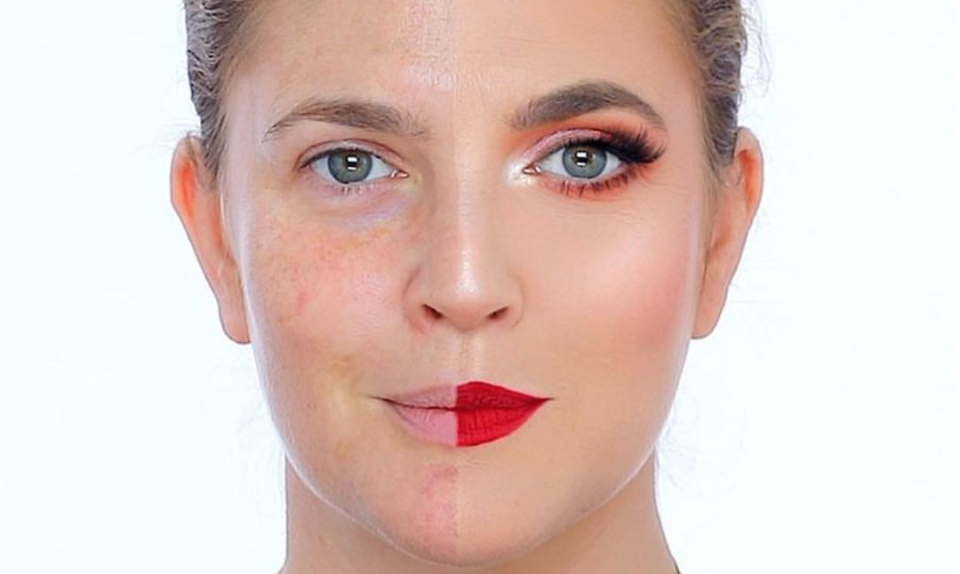 Drew Barrymore had her half-face of makeup done by Nikkie Tutorials. [Photo: Instagram]]