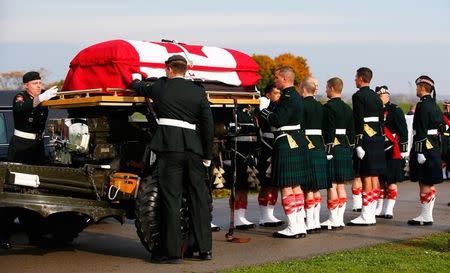 Soldiers adjust the coffin during the funeral procession for Cpl. Nathan Cirillo in Hamilton
