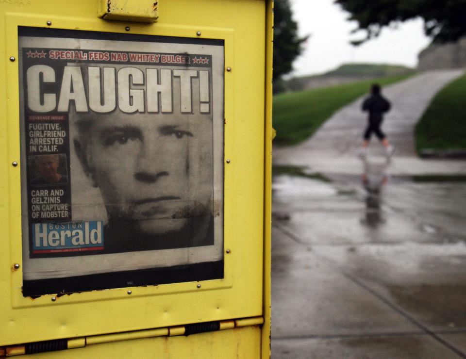 A newspaper on display showing Whitey Bulger caught