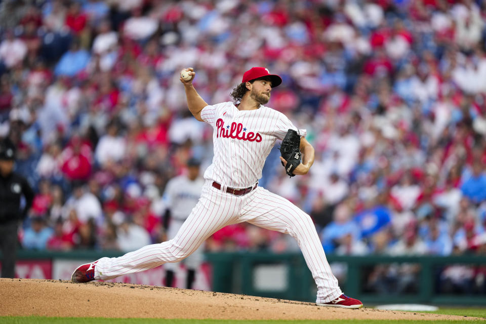 Philadelphia Phillies' Aaron Nola pitches during the second inning of a baseball game against the Miami Marlins, Tuesday, April 11, 2023, in Philadelphia. (AP Photo/Matt Rourke)