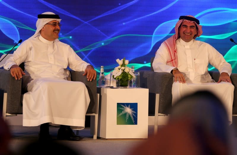 Amin H. Nasser, president and CEO of Saudi Aramco, and Yasser al-Rumayyan, Aramco's chairman, attend a news conference in Dhahran