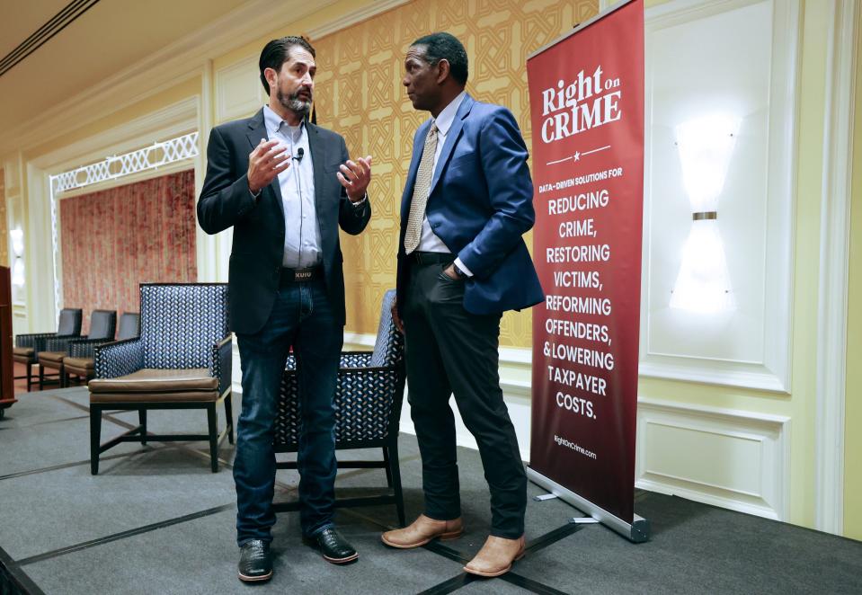Brett Tolman, Right on Crime executive director, and Rep. Burgess Owens, R-Utah, talk at The Dollars and Sense of Second Chance Hiring: A Utah Employer Engagement Forum, hosted by Right on Crime, at the Little America in Salt Lake City on Thursday, Aug. 24, 2023. | Kristin Murphy, Deseret News