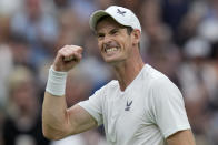 Britain's Andy Murray celebrates after beating Britain's Ryan Peniston during a first round men's singles match on day two of the Wimbledon tennis championships in London, Tuesday, July 4, 2023. (AP Photo/Alastair Grant)